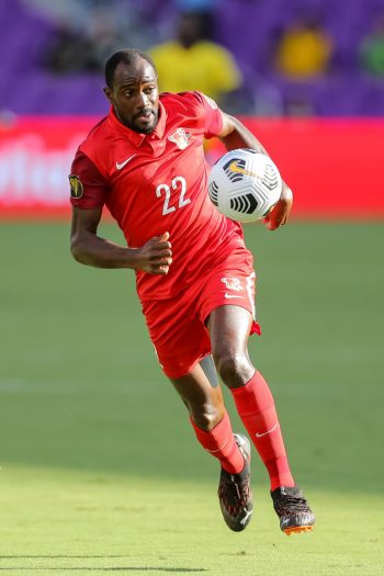 Guadeloupe forward DIMITRI RAMOTHE (22) chases down the ball during the 2021 Concacaf Gold Cup Guadeloupe vs Jamaica soccer match at Exploria Stadium in Orlando, Fl on July 16, 2021.