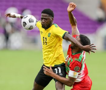 Jamaica forward SHAMAR NICHOLSON (11) attacks the ball during the 2021 Concacaf Gold Cup Jamaica vs Suriname soccer match at Exploria Stadium in Orlando, Fl on July 12, 2021.