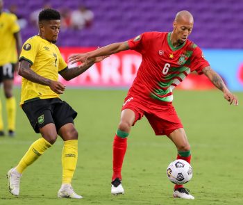 Suriname midfielder RYAN KOOLWIJK (6) sets up a play during the 2021 Concacaf Gold Cup Jamaica vs Suriname soccer match at Exploria Stadium in Orlando, Fl on July 12, 2021.