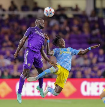 Orlando City forward BENJI MICHEL (19) gets a header against Philadelphia Union defender OLIVIER MBAIZO (15) during the Orlando City vs Philadelphia Union  match at Exploria Stadium in Orlando, Fl on July 22, 2021.