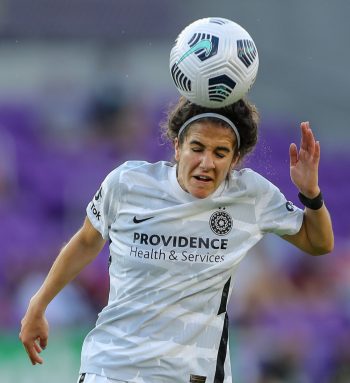 Portland Thorns FC midfielder ANGELA SALEM (36) goes up for a header during the NWSL Orlando Pride vs Portland Thorns FC soccer match at Exploria Stadium in Orlando, Fl on May 26, 2021.