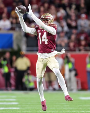 Florida State Seminoles wide receiver JOHNNY WILSON (14) makes a catch during the 2022 NCAA Cheez-It Bowl game between the Florida State Seminoles and Oklahoma Sooners at Camping World Stadium  in Orlando, FL on December 29, 2022.