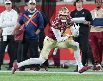 Florida State Seminoles wide receiver JOHNNY WILSON (14) makes a catch during the 2022 NCAA Cheez-It Bowl game between the Florida State Seminoles and Oklahoma Sooners at Camping World Stadium  in Orlando, FL on December 29, 2022.