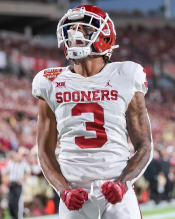 Oklahoma Sooners wide receiver JALIL FAROOQ (3) celebrates after a touchdown attempt during the 2022 NCAA Cheez-It Bowl game between the Florida State Seminoles and Oklahoma Sooners at Camping World Stadium  in Orlando, FL on December 29, 2022.