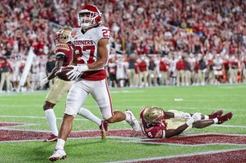 Oklahoma Sooners running back GAVIN SAWCHUK (27) runs in for a touchdown during the 2022 NCAA Cheez-It Bowl game between the Florida State Seminoles and Oklahoma Sooners at Camping World Stadium  in Orlando, FL on December 29, 2022.