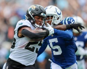 Jacksonville Jaguars running back JAMES ROBINSON (25) runs the ball in for a touchdown during the Jacksonville Jaquars vs Indianapolis Colts NFL game at TIAA Bank Field Stadium in Jacksonville, Fl on September 18, 2022.