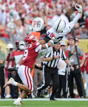 Penn State Nittany Lions wide receiver PARKER WASHINGTON (3) makes a leaping catch during the Outback Bowl at Raymond James Stadium in Tampa, FL on January 1, 2022.