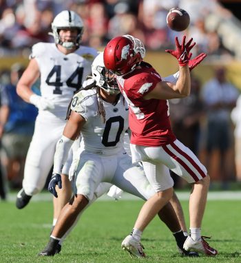Arkansas Razorbacks defensive back NATHAN PARODI (14) receives the ball during the Outback Bowl at Raymond James Stadium in Tampa, FL on January 1, 2022.