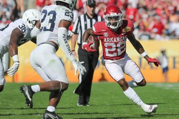 Arkansas Razorbacks running back TRELON SMITH (22) runs the ball during the Outback Bowl at Raymond James Stadium in Tampa, FL on January 1, 2022.