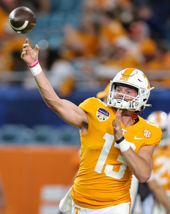 Tennessee Volunteers quarterback GASTON MOORE (13) throws the ball during the 2022 NCAA Capital One Orange  Bowl game between the Tennessee Volunteers  and the Clemson Tigers at Hard Rock Stadium  in Miami Gardens, FL on December 30, 2022.
