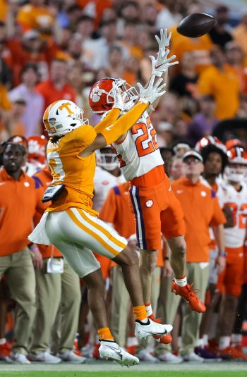 Clemson Tigers wide receiver COLE TURNER (22) leaps for a catch while being defended by Tennessee Volunteers defensive back WESLEY WALKER (13) during the 2022 NCAA Capital One Orange  Bowl game between the Tennessee Volunteers  and the Clemson Tigers at Hard Rock Stadium  in Miami Gardens, FL on December 30, 2022.