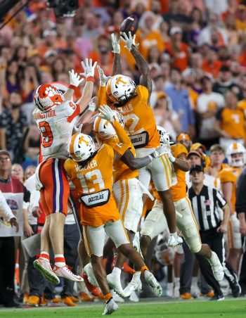 Tennessee Volunteers defensive back TAMARION MCDONALD (12) leaps for an interception catch during the 2022 NCAA Capital One Orange  Bowl game between the Tennessee Volunteers  and the Clemson Tigers at Hard Rock Stadium  in Miami Gardens, FL on December 30, 2022.