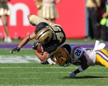 Purdue Boilermakers running back DEVIN MOCKOBEE (45) gets tackled after running the ball during the 2023 NCAA Cheez-It Citrus Bowl game between the LSU Fighting Tigers and the Purdue Boilermakers at Camping World Stadium in Orlando, FL on January 2, 2023.