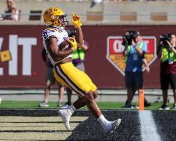 LSU Tigers running back NOAH CAIN (21) runs the ball in for a touchdown during the 2023 NCAA Cheez-It Citrus Bowl game between the LSU Fighting Tigers and the Purdue Boilermakers at Camping World Stadium in Orlando, FL on January 2, 2023.