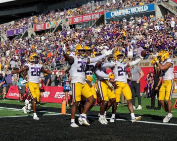 LSU Tigers wide receiver LANDON IBIETA (24) and teammates celebrate after a touchdown during the 2023 NCAA Cheez-It Citrus Bowl game between the LSU Fighting Tigers and the Purdue Boilermakers at Camping World Stadium in Orlando, FL on January 2, 2023.