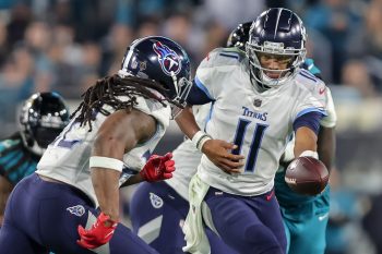 Tennessee Titans quarterback JOSHUA DOBBS (11) hands off the ball during the Jacksonville Jaguars vs Tennessee Titans NFL game at TIAA Bank Field Stadium in Jacksonville, Fl on January 7, 2023.