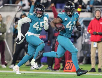 Jacksonville Jaguars linebacker JOSH ALLEN (41) returns an interception for a touchdown during the Jacksonville Jaguars vs Tennessee Titans NFL game at TIAA Bank Field Stadium in Jacksonville, Fl on January 7, 2023.