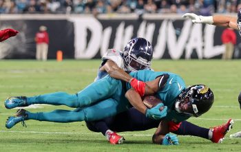 Jacksonville Jaguars wide receiver ZAY JONES (7) gets tackled during the Jacksonville Jaguars vs Tennessee Titans NFL game at TIAA Bank Field Stadium in Jacksonville, Fl on January 7, 2023.