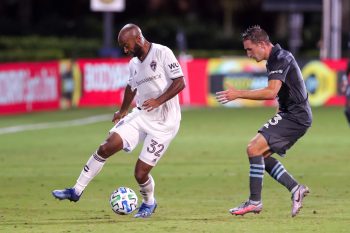 Colorado Rapids midfielder COLLEN WARNER (32) makes a play against Minnesota United midfielder ETHAN FINLAY (13) during the MLS is Back Tournament Colorado Rapids vs Minnesota United FC match at ESPN Wide World of Sports Complex in Orlando, Fl on July 22, 2020.
