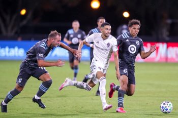 Colorado Rapids midfielder YOUNES NAMLI (21) competes for the ball against Minnesota United midfielder HASSANI DOTSON (31) during the MLS is Back Tournament Colorado Rapids vs Minnesota United FC match at ESPN Wide World of Sports Complex in Orlando, Fl on July 22, 2020.