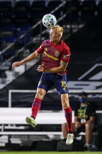 Real Salt Lake defender JUSTEN GLAD (15) goes up for a header during the MLS is Back Tournament San Jose Earthquakes vs Real Salt Lake match at ESPN Wide World of Sports Complex in Orlando, Fl on July 27, 2020.