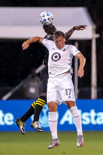 Minnesota United midfielder ROBIN LOD (17) goes up for a header during the MLS is Back Tournament Columbus Crew SC vs Minnesota United FC match at ESPN Wide World of Sports Complex in Orlando, Fl on July 28, 2020.