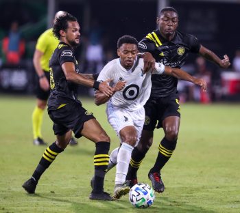 Minnesota United midfielder JACORI HAYES (5) battles for control against Columbus Crew forward FANENDO ADI (9) and Columbus Crew midfielder ARTUR (8) during the MLS is Back Tournament Columbus Crew SC vs Minnesota United FC match at ESPN Wide World of Sports Complex in Orlando, Fl on July 28, 2020.