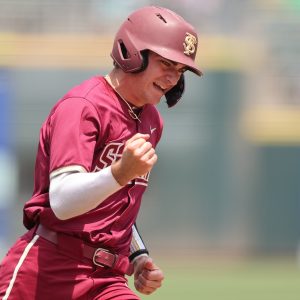 May 25, 2024; Charlotte, NC, USA; Florida State infielder Alex Lodise (1) reacts after scoring a run in the second inning against Wake Forest during the ACC Baseball Tournament at Truist Field. Mandatory Credit: Cory Knowlton-USA TODAY Sports