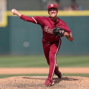 May 25, 2024; Charlotte, NC, USA; Florida State pitcher Conner Whittaker (13) throws a pitch in the ninth inning against Wake Forest during the ACC Baseball Tournament at Truist Field. Mandatory Credit: Cory Knowlton-USA TODAY Sports