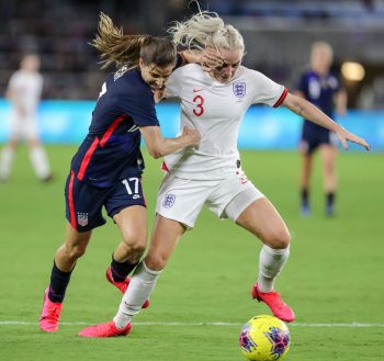 United States forward TOBIN HEATH (17) competes for the ball against England defender ALEX GREENWOOD (3) during the SheBelieves Cup United States vs England match at Exploria Stadium in Orlando, Fl on March 5, 2020.