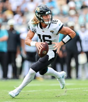 Jacksonville Jaguars quarterback TREVOR LAWRENCE (16) runs the ball during the Jacksonville Jaquars vs Indianapolis Colts NFL game at TIAA Bank Field Stadium in Jacksonville, Fl on September 18, 2022.