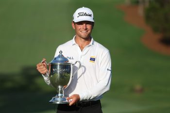 GREENSBORO, NC - AUGUST 9: Michael Brennan of USA poses with the victor's trophy after winning the Wyndham Championship at Sedgefield Country Club on August 9, 2026 in Greensboro, North Carolina.