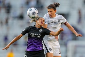 Orlando Pride forward MARTA (10) goes up for a header against Portland Thorns FC forward CHRISTINE SINCLAIR (12) during the NWSL Orlando Pride vs Portland Thorns FC soccer match at Exploria Stadium in Orlando, Fl on May 26, 2021.