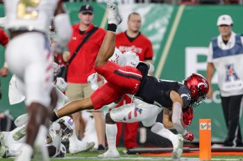 Tampa, FL - November 12: Cincinnati Bearcats running back Ryan Montgomery (22) dives for a touchdown during a college football game between South Florida Bulls and Cincinnati Bearcats played on November 12, 2021 at Raymond James Stadium in Tampa, FL. (Photo credit: Cory Knowlton/Sportscene Media)