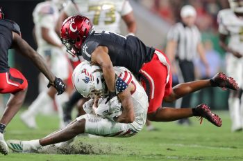 Tampa, FL - November 12: South Florida Bulls wide receiver Xavier Weaver (10) gets tackled during a college football game between South Florida Bulls and Cincinnati Bearcats played on November 12, 2021 at Raymond James Stadium in Tampa, FL. (Photo credit: Cory Knowlton/Sportscene Media)