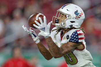 Tampa, FL - November 12: South Florida Bulls wide receiver Xavier Weaver (10) receives the ball during a college football game between South Florida Bulls and Cincinnati Bearcats played on November 12, 2021 at Raymond James Stadium in Tampa, FL. (Photo credit: Cory Knowlton/Sportscene Media)