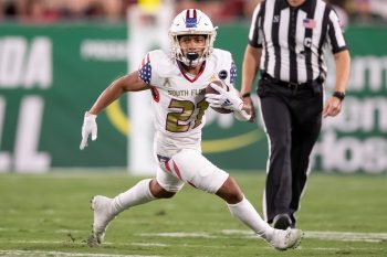 Tampa, FL - November 12: South Florida Bulls running back Brian Battie (21) runs the ball during a college football game between South Florida Bulls and Cincinnati Bearcats played on November 12, 2021 at Raymond James Stadium in Tampa, FL. (Photo credit: Cory Knowlton/Sportscene Media)