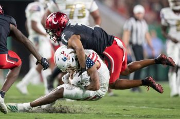 Tampa, FL - November 12: South Florida Bulls wide receiver Xavier Weaver (10) gets tackled during a college football game between South Florida Bulls and Cincinnati Bearcats played on November 12, 2021 at Raymond James Stadium in Tampa, FL. (Photo credit: Cory Knowlton/Sportscene Media)