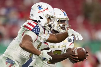 Tampa, FL - November 12: South Florida Bulls quarterback Timmy McClain (9) hands off the ball to South Florida Bulls running back Jaren Mangham (0) during a college football game between South Florida Bulls and Cincinnati Bearcats played on November 12, 2021 at Raymond James Stadium in Tampa, FL. (Photo credit: Cory Knowlton/Sportscene Media)