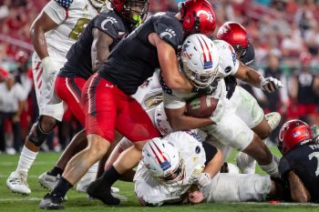 Tampa, FL - November 12: South Florida Bulls running back Jaren Mangham (0) gets tackled during a college football game between South Florida Bulls and Cincinnati Bearcats played on November 12, 2021 at Raymond James Stadium in Tampa, FL. (Photo credit: Cory Knowlton/Sportscene Media)