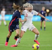 United States forward TOBIN HEATH (17) competes for the ball against England defender ALEX GREENWOOD (3) during the SheBelieves Cup United States vs England match at Exploria Stadium in Orlando, Fl on March 5, 2020.