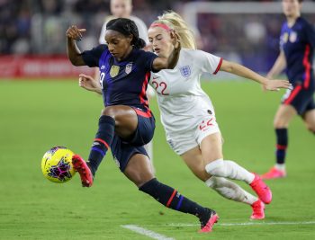 United States defender CRYSTAL DUNN (19) in action against England forward CHLOE KELLY (22) during the SheBelieves Cup United States vs England match at Exploria Stadium in Orlando, Fl on March 5, 2020.