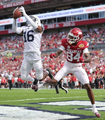 Penn State Nittany Lions safety JI'AYIR BROWN (16) intercepts the ball during the Outback Bowl at Raymond James Stadium in Tampa, FL on January 1, 2022.
