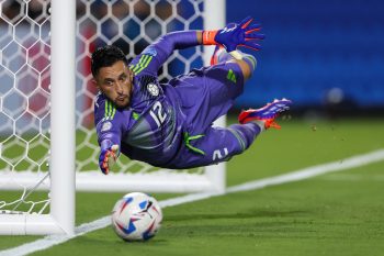 Colombia goalkeeper CAMILO VARGAS (12) makes a diving save during the second half of the CONMEBOL Copa America semi-final match between Uruguay and Columbia at Bank of America Stadium in Charlotte, NC on July 10, 2024.