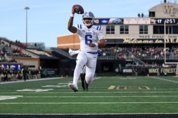 Duke Blue Devils quarterback MAALIK MURPHY (6) runs the ball in for a touchdown during the fourth quarter of the Wake Forest Demon Deacons vs Duke Blue Devils NCAA football game at Allegacy Stadium in Winston-Salem, NC on November 30, 2024.