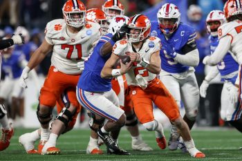 Clemson Tigers quarterback CADE KLUBNIK (2) gets a face mask that isn’t called for a penalty during the third quarter of the 2024 NCAA ACC Championship game between the SMU Mustangs and the Clemson Tigers at the Bank of America Stadium in Charlotte, NC on December 7, 2024.